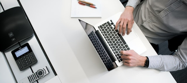 Image of person working on computer.
